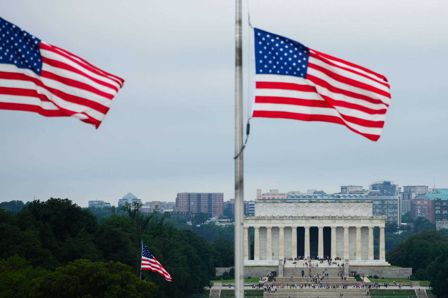 American flags fly above the Lincoln Memorial, Thursday, July 9, 2026, in Washington. (AP Photo/Jul...