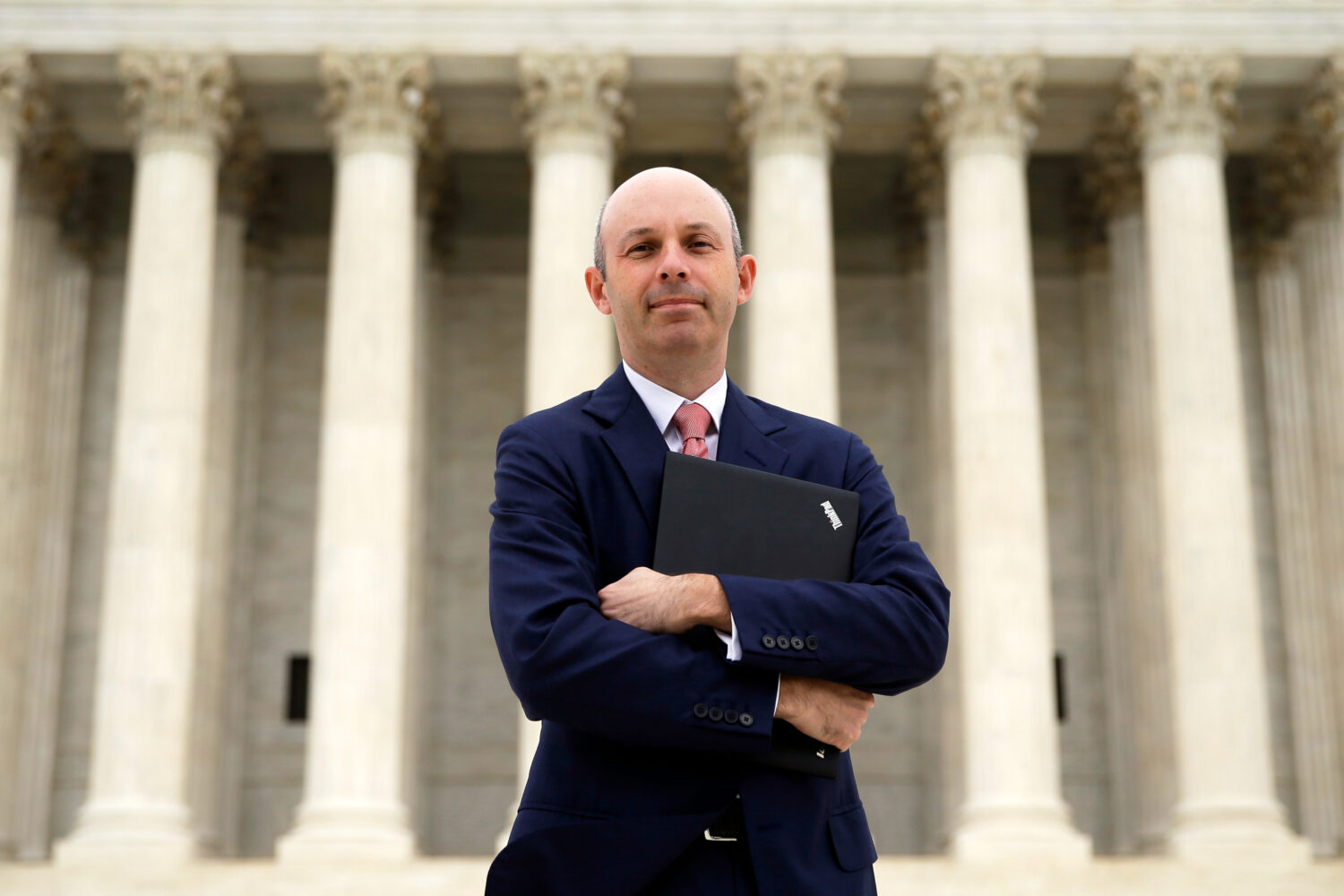 FILE - Tom Goldstein, who writes SCOTUSblog.com, poses for a photograph in front of the Supreme Cou...