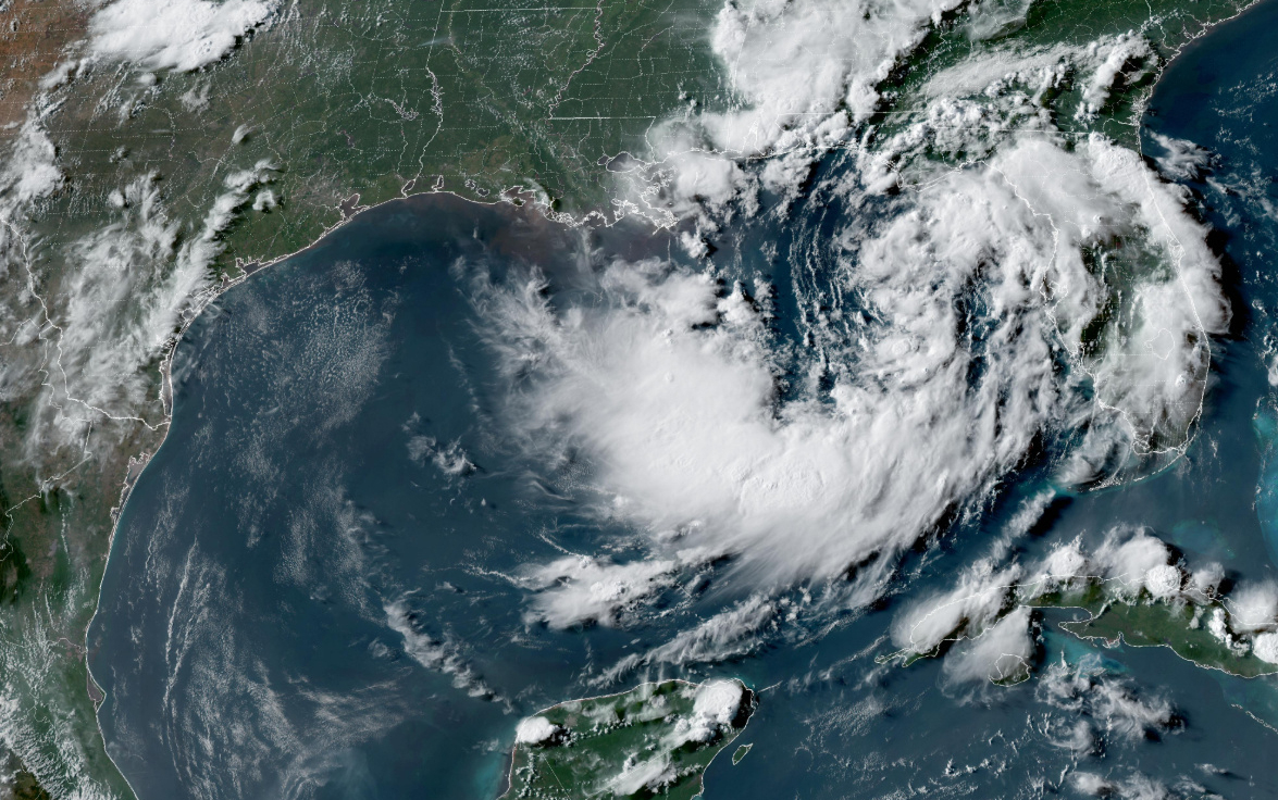 This satellite image from the National Oceanic and Atmospheric Administration shows a tropical depr...