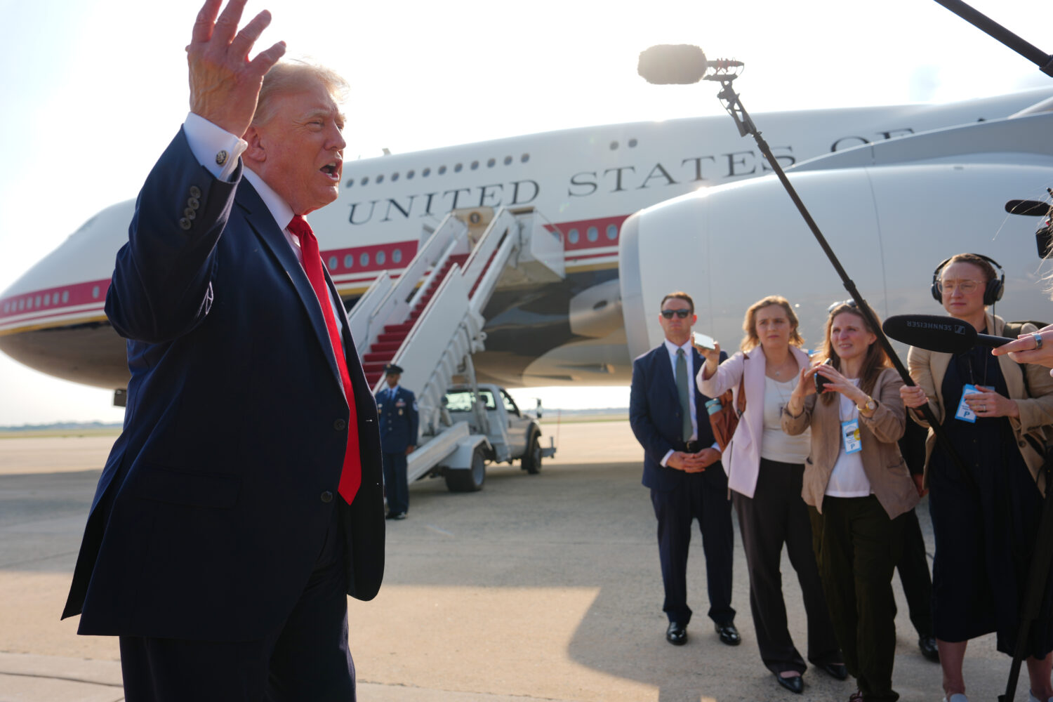 President Donald Trump speaks to reporters before boarding Air Force One, Wednesday, July 1, 2026, ...