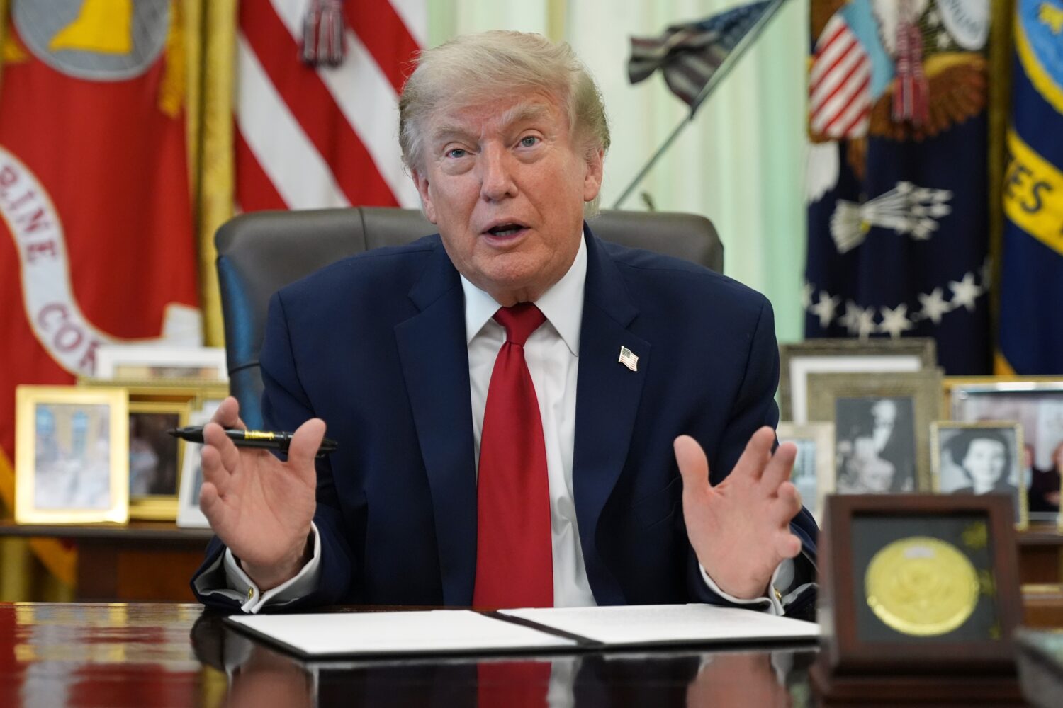 President Donald Trump speaks before signing a presidential memo to the EPA on pollution control in...