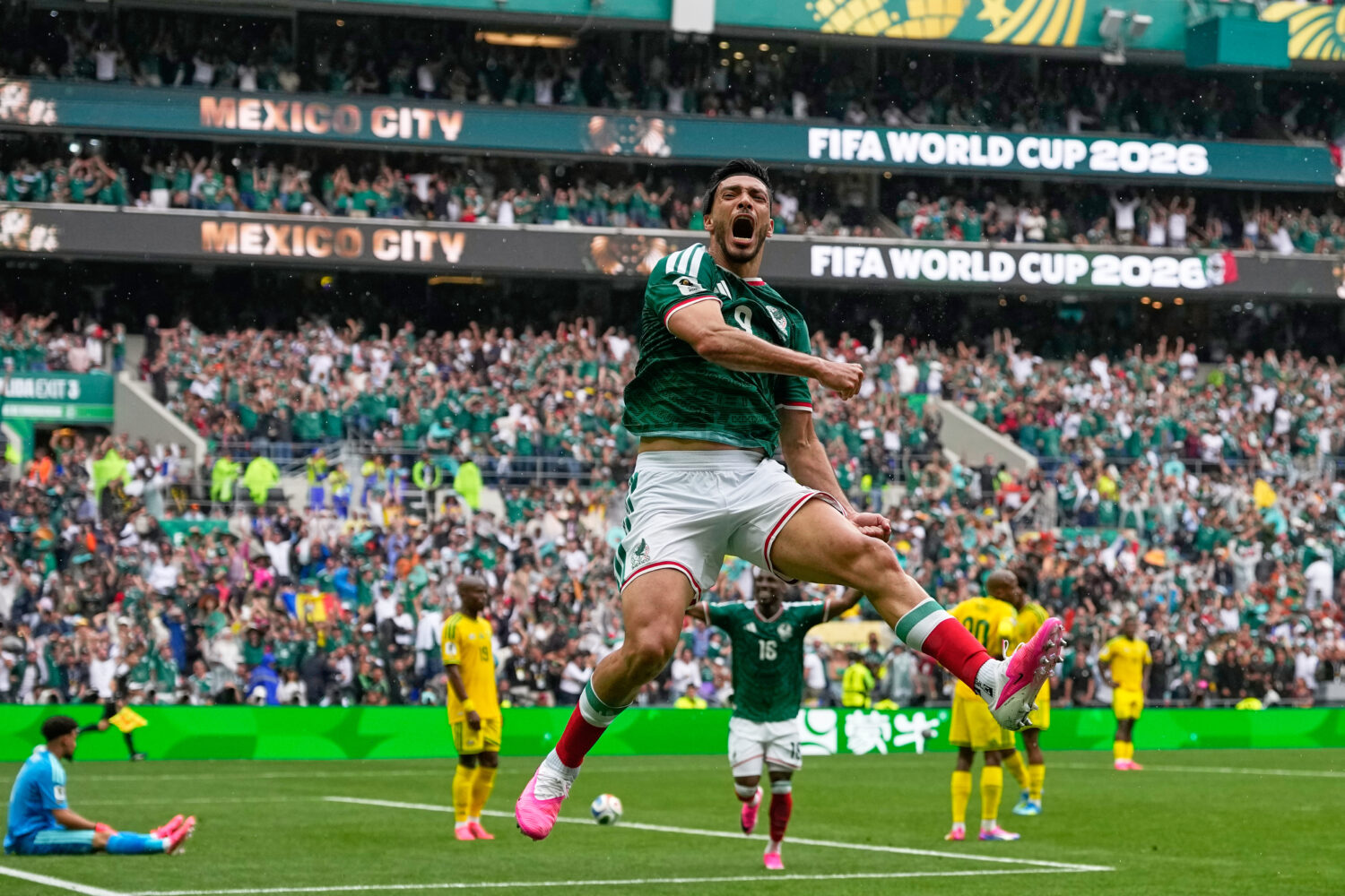 Mexico's Raul Jimenez celebrates after scoring his side's second goal during the World Cup Group A ...