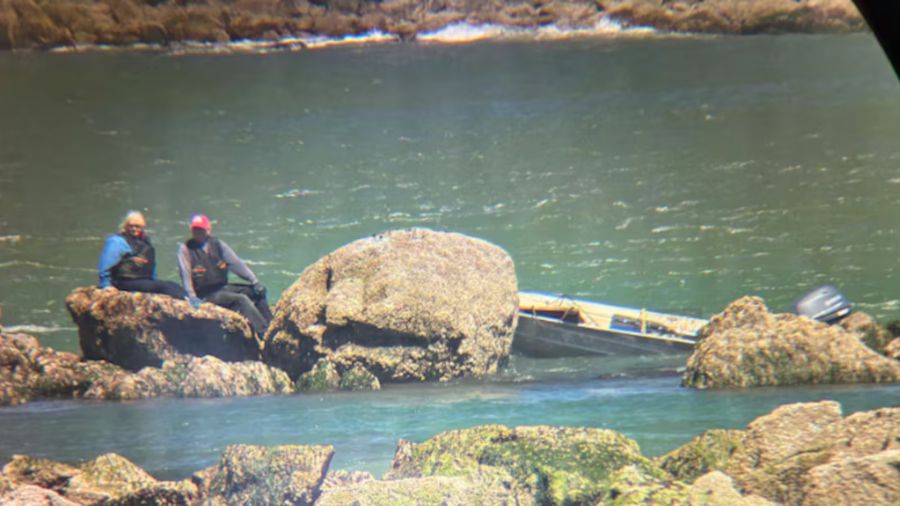 Coquille River 2 people stranded oregon coast guard...