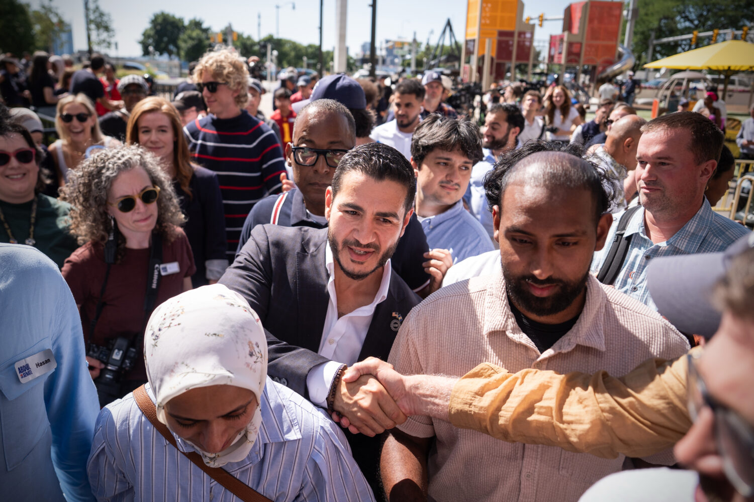 Abdul El-Sayed departs following a news conference at the Spirit of Detroit shortly after winning t...