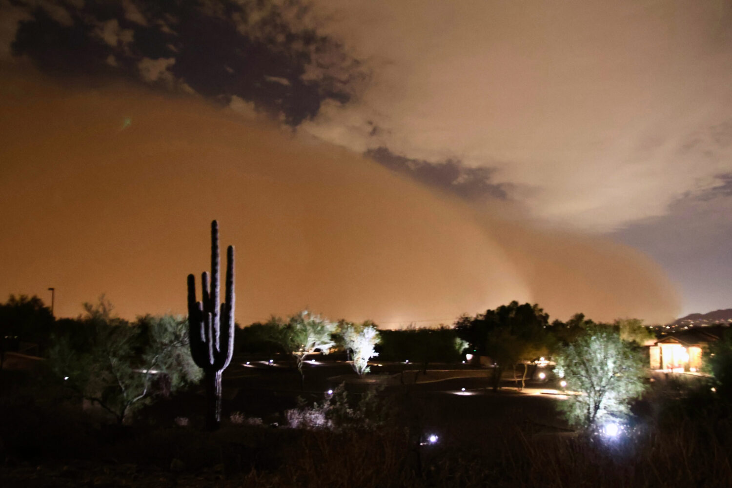 This photo provided by Sean Voysey Olson shows a large haboob dust storm Monday, Aug. 3, 2026, in S...
