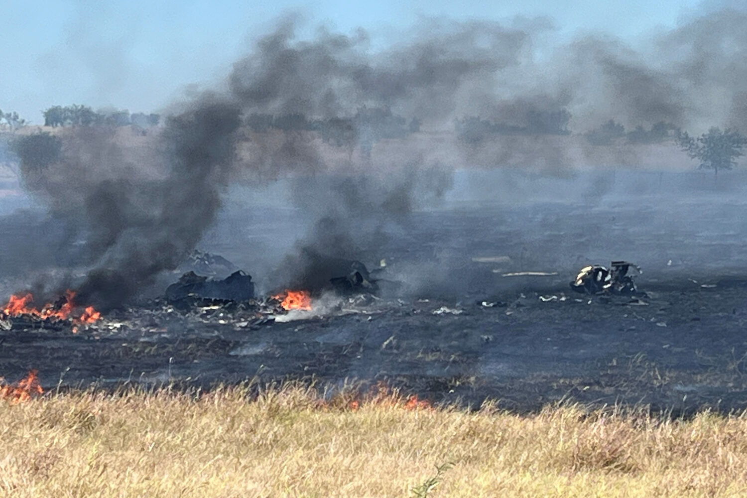 This photo provided by the Bell County Sheriff's Office shows the scene of an Army Apache helicopte...