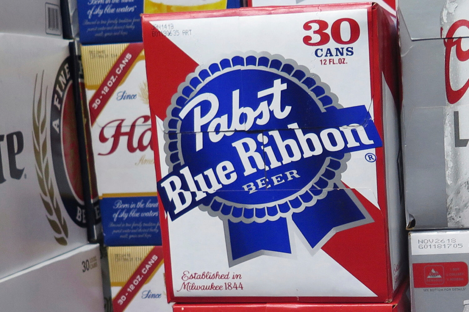 FILE - Cases of Pabst Blue Ribbon beer are stacked in a liquor store, Nov. 8, 2018, in Milwaukee. (...