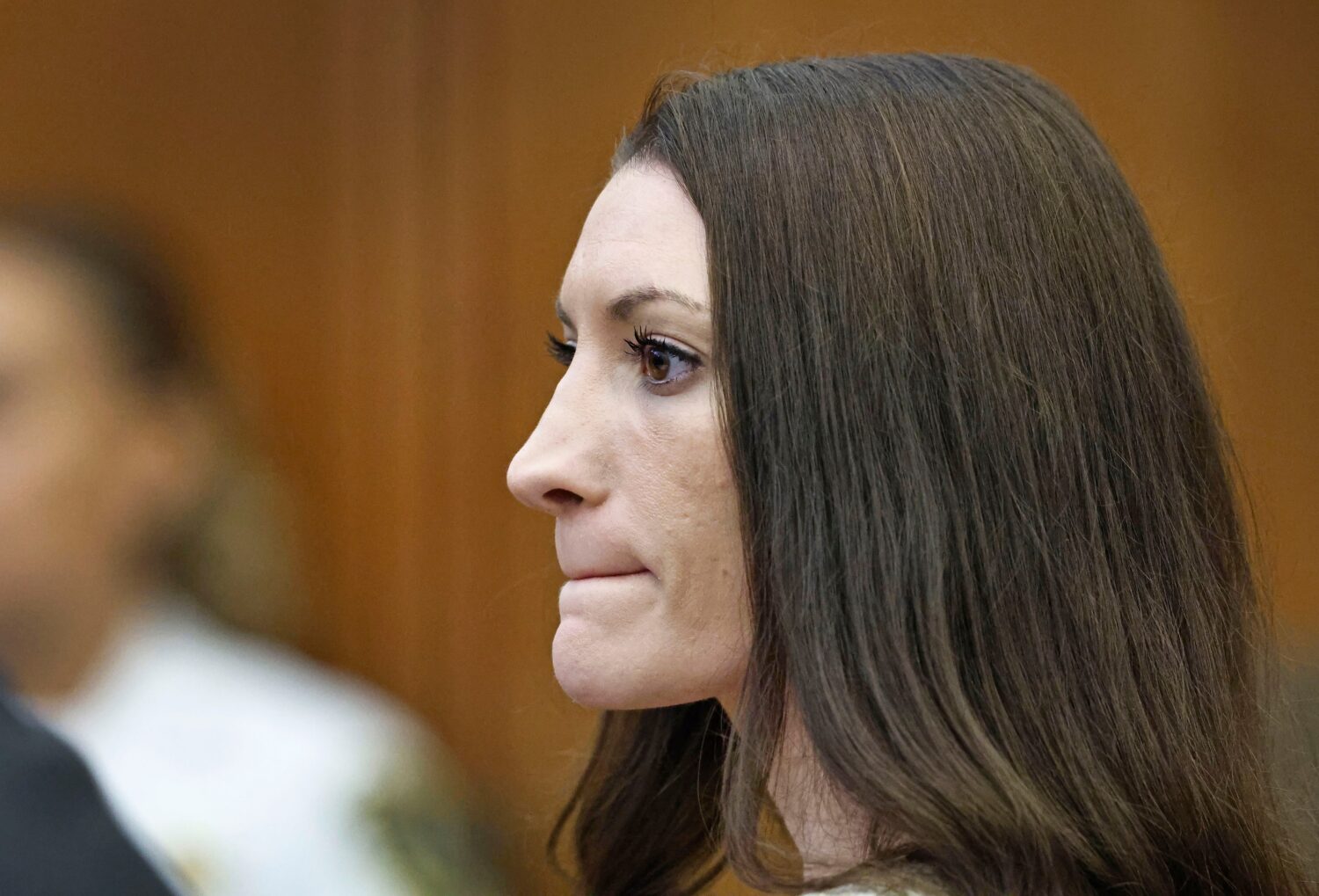 CORRECTS SPELLING TO LINDSAY - Lindsay Clancy listens to the testimony of Dr. Gregory Saathoff duri...
