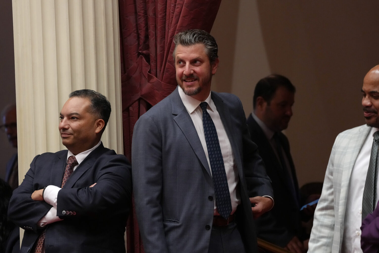 Democratic State Senator Henry Stern, of Los Angeles, smiles as the leaves the Senate Chambers duri...
