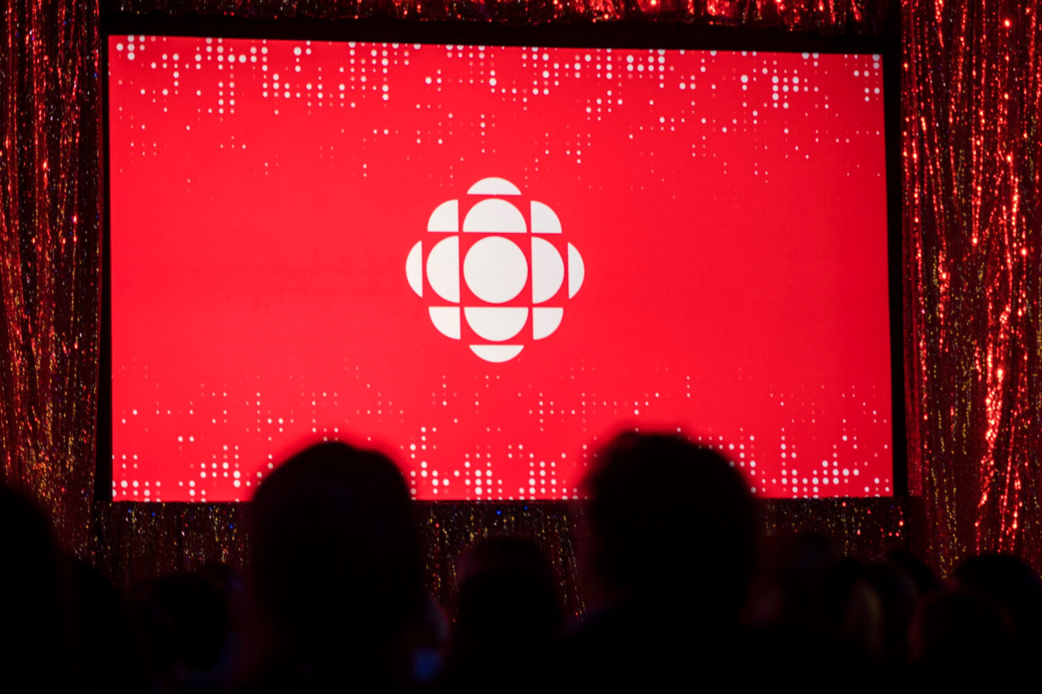 FILE - The Canadian Broadcasting Corporation logo is projected onto a screen on May 29, 2019, in To...