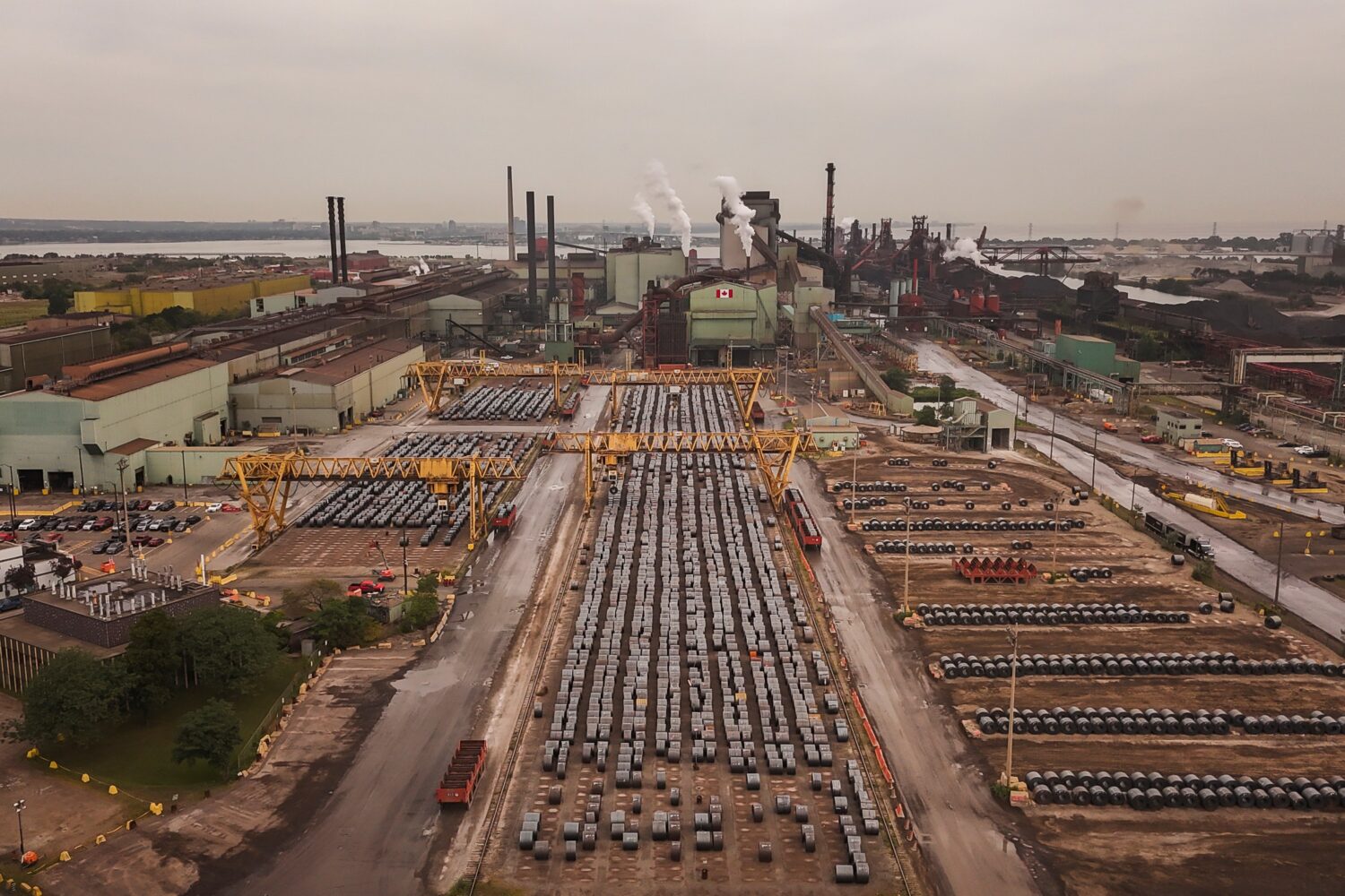 Rolled coils of steel sit in the yard at the ArcelorMittal Dofasco steel plant in Hamilton, Ont. on...