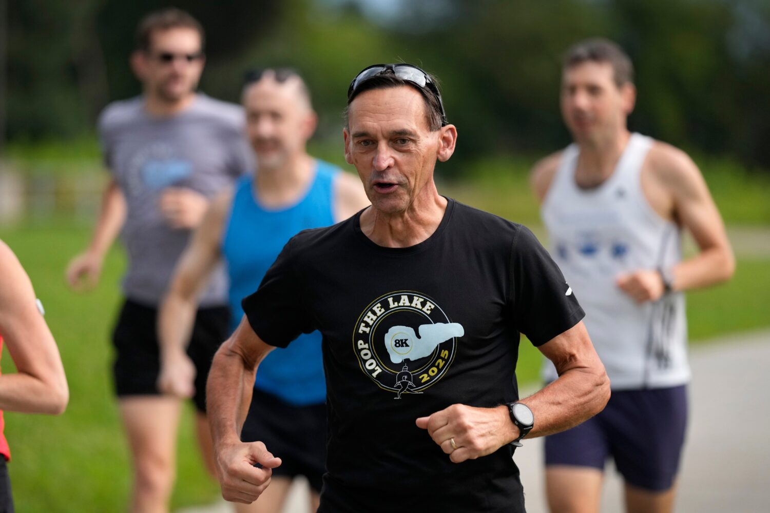Paul Grinvalds, of West Des Moines, Iowa, runs with the Raccoon River Running Club, Sunday, Aug. 9,...