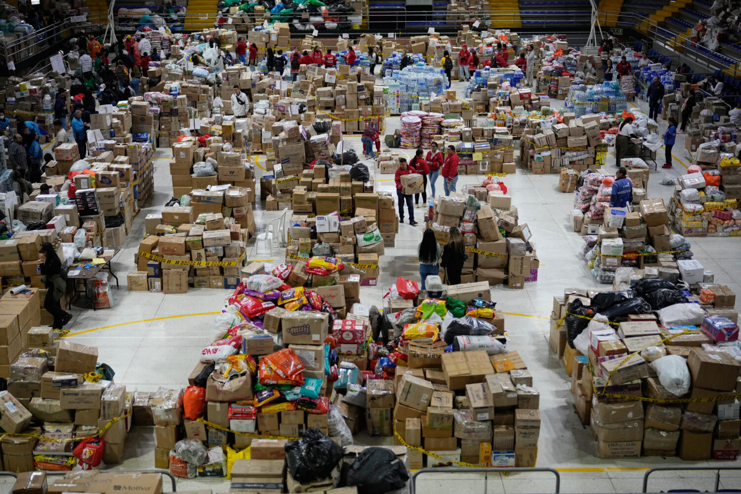 Volunteers sort aid bound for people affected by the earthquake in Choco department, in Bogota, Col...