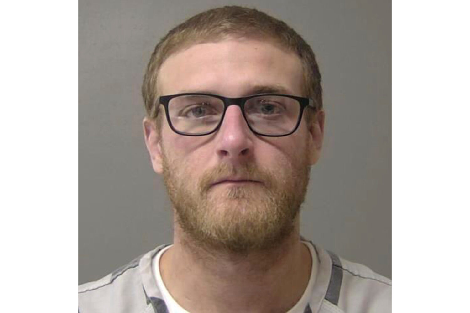 FILE - This booking photo provided by the Macon County, Ill., Jail in January 2025, shows Sean Gray...