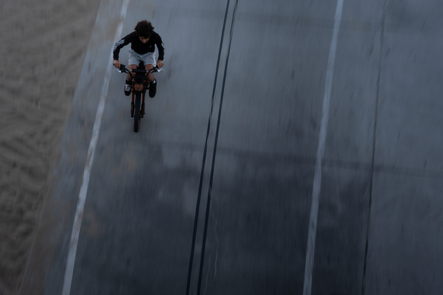 A boy rides an e-bike in Santa Monica, Calif., Monday, Aug. 10, 2026. (AP Photo/Jae C. Hong)Credit:...