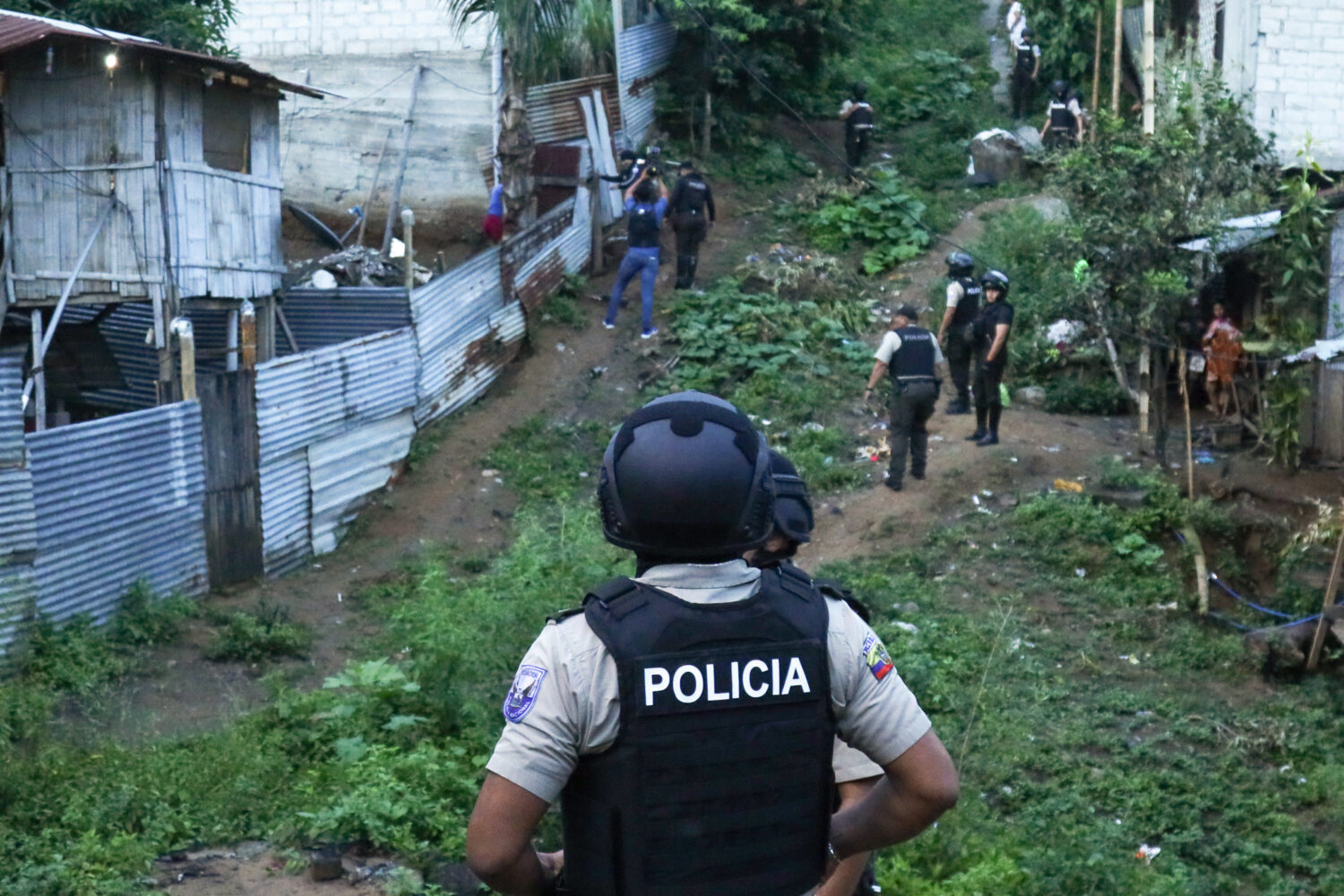 FILE - Police conduct an operation searching for weapons and or drugs as part of an effort to comba...