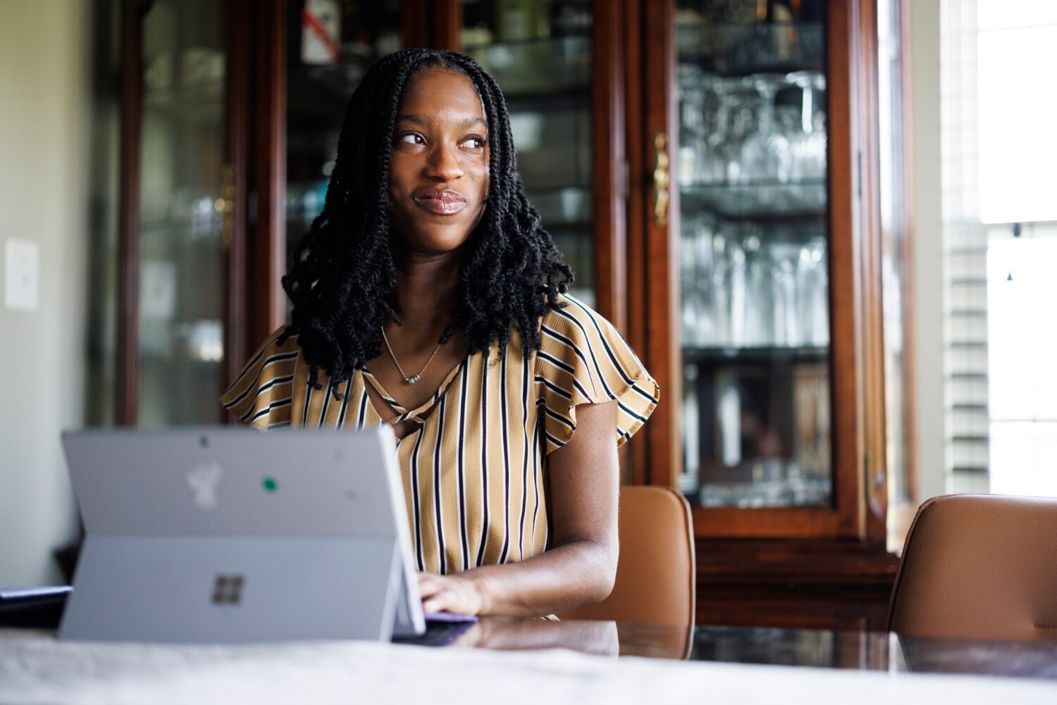 Faith Maeba, a student at Virginia Commonwealth University, poses for a portrait with her tablet at...
