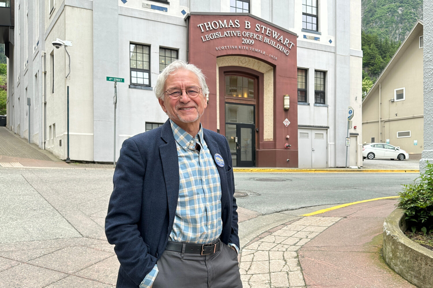 FILE - DDemocratic gubernatorial candidate Tom Begich poses for a photo in downtown Juneau, Alaska,...