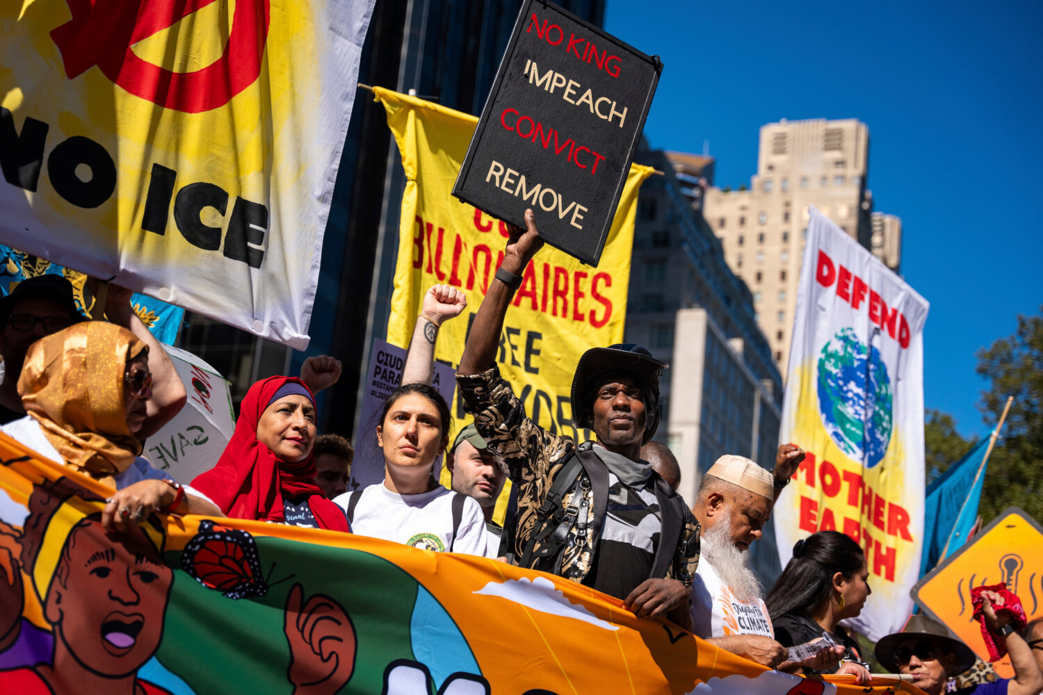FILE - Protestors march through Manhattan up to Central Park during the "Make Billionaires Pay" cli...