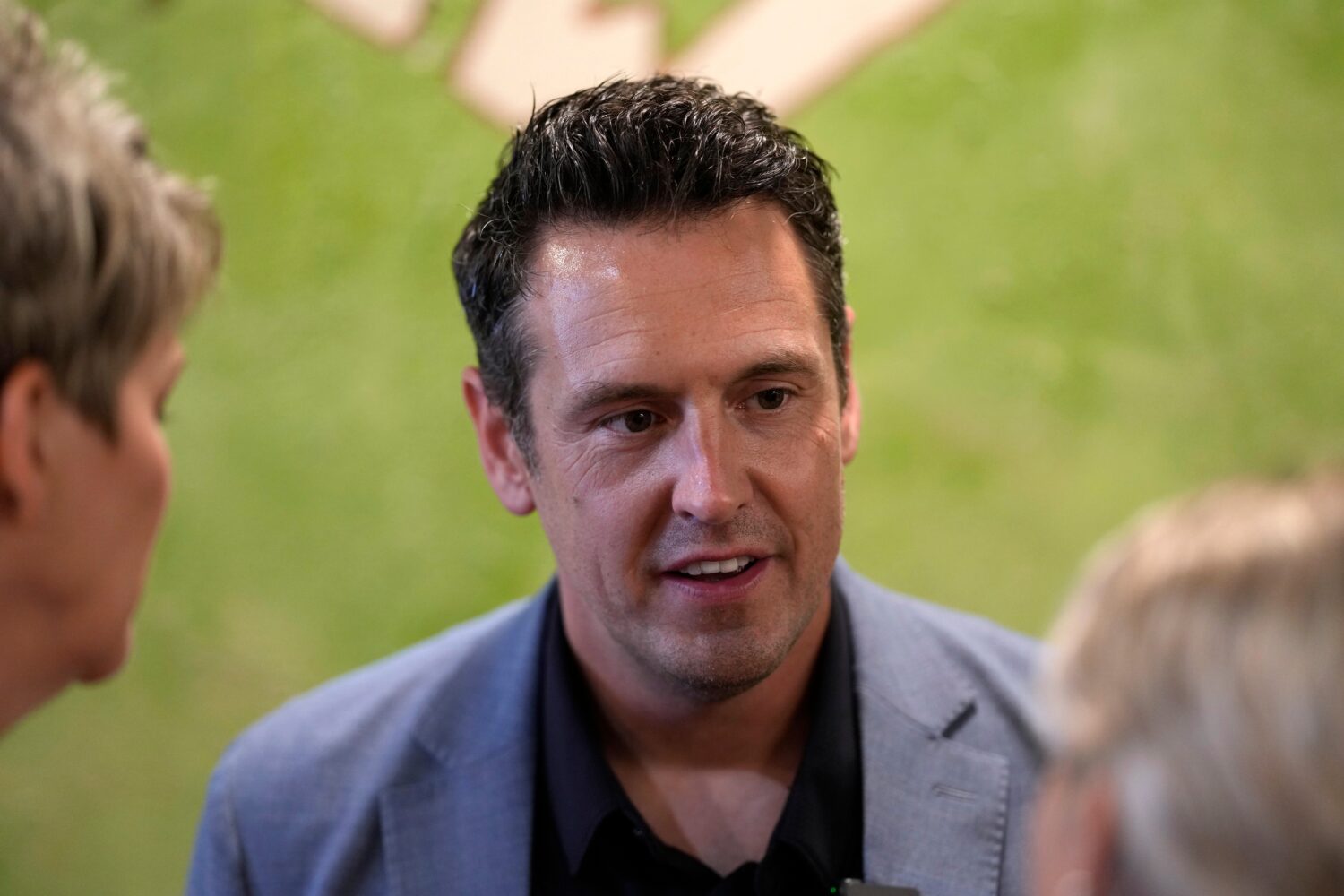 Zach Lahn, Republican candidate for Iowa governor, speaks to local residents during a meet and gree...