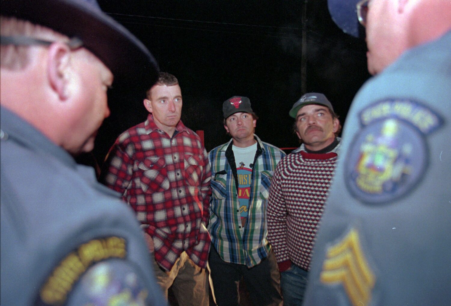 FILE - Maine loggers Stacey Kelly, second from left, Troy Jackson, and Hilton Hafford are threatene...