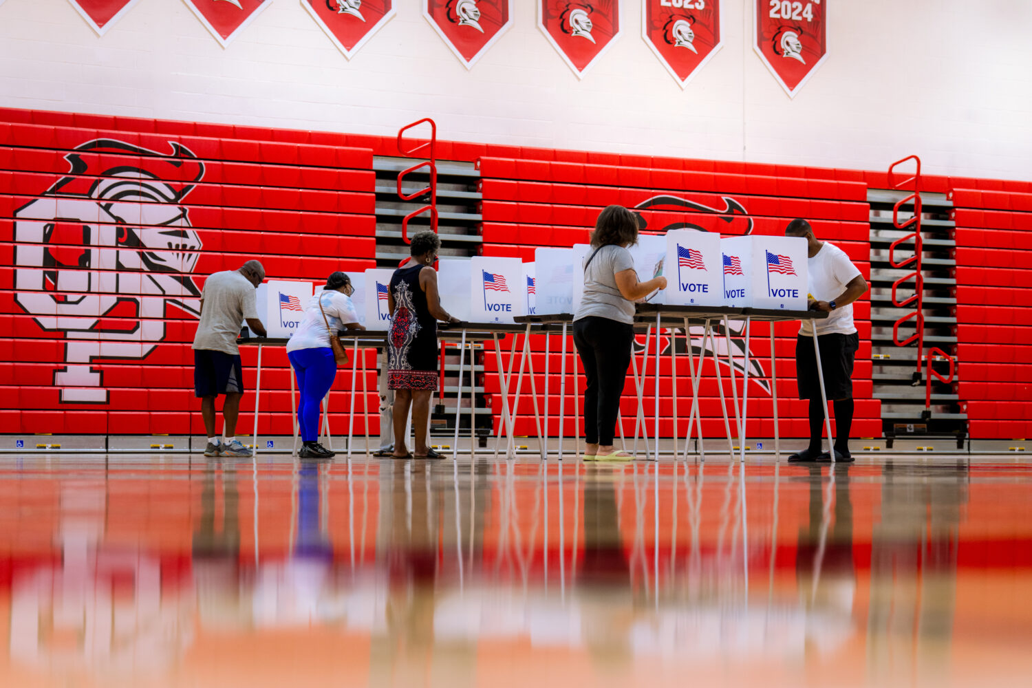 People vote in the primary election at Oak Park High School in Oak Park, Mich., Tuesday, Aug. 4, 20...