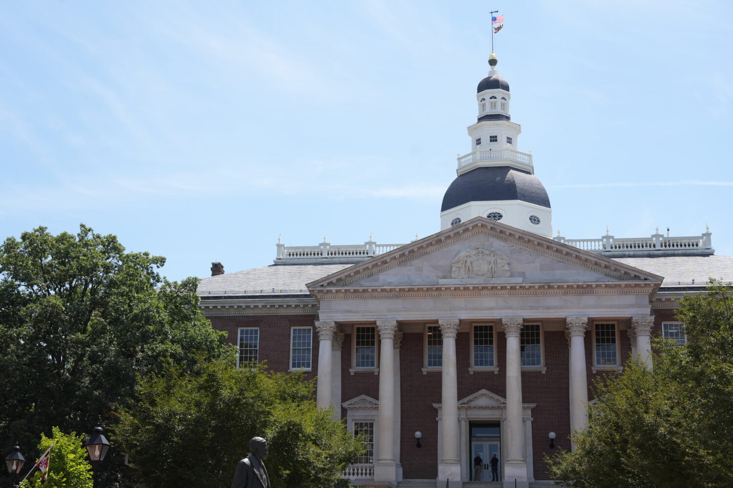 People stand at the doors of the Maryland State House on Tuesday, Aug. 4, 2026, in Annapolis, Md. (...
