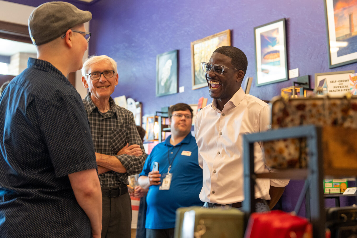 David Crowley, right, Democratic candidate for Wisconsin governor talks with CJ Arthur, left, owner...
