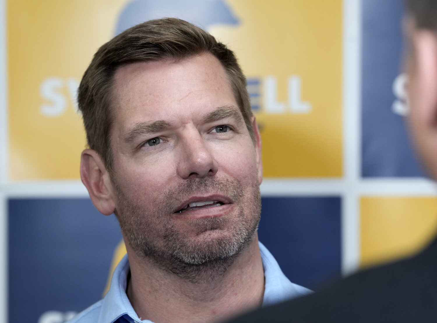 FYI - Rep. Eric Swalwell, D-Calif., talks with reporters after holding a town hall meeting in Sacra...