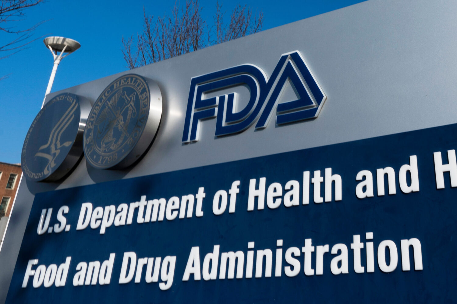 FILE - A sign for the U.S. Food and Drug Administration is displayed outside their offices in Silve...