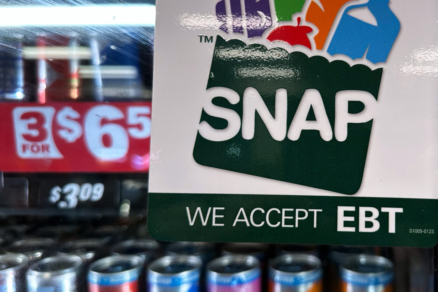 FILE - A SNAP EBT information sign is displayed at a gas station in Riverwoods, Ill., Nov. 1, 2025....