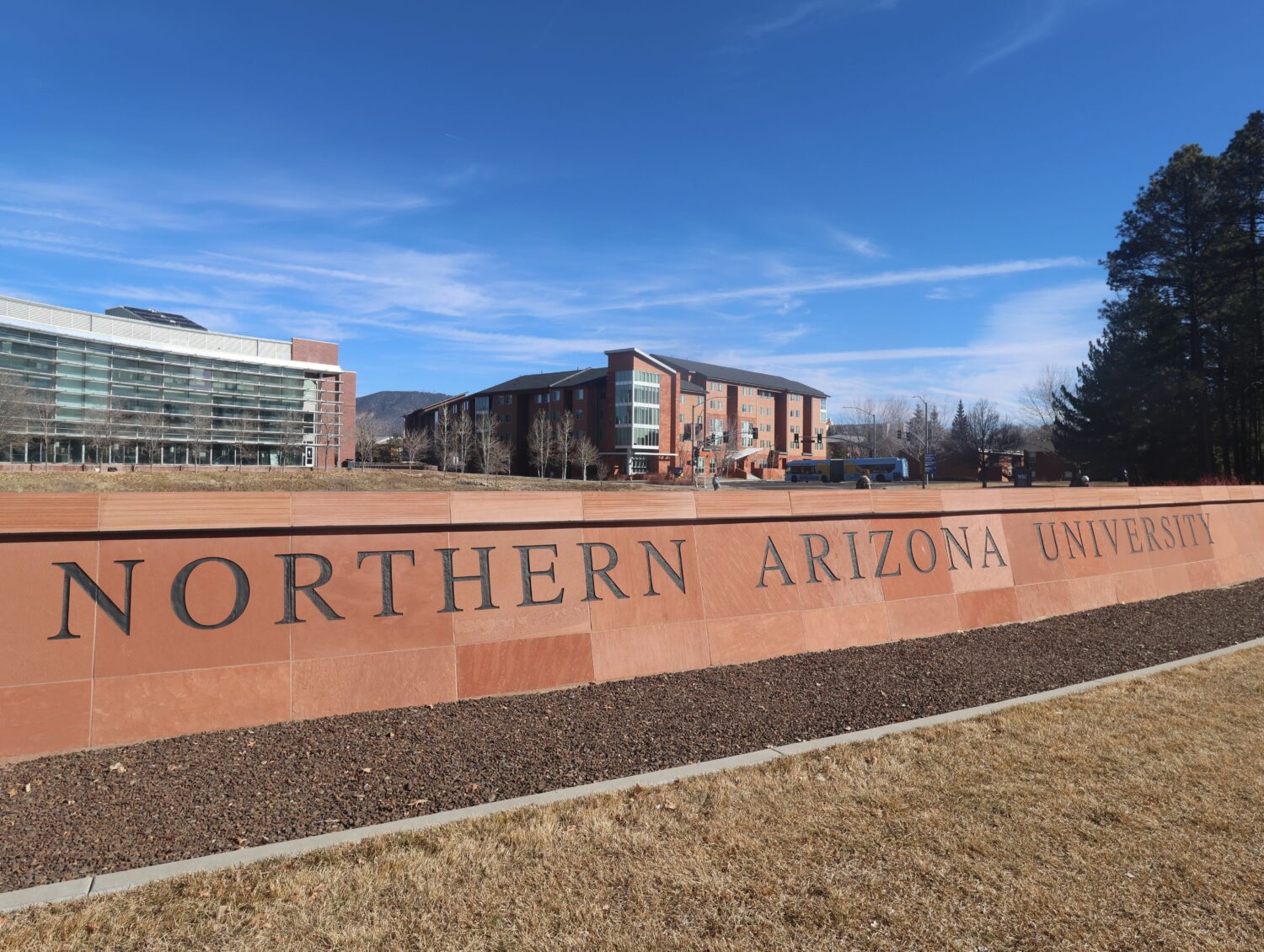 FILE - A sign is displayed for the Northern Arizona University campus in Flagstaff, Ariz., Feb. 2, ...