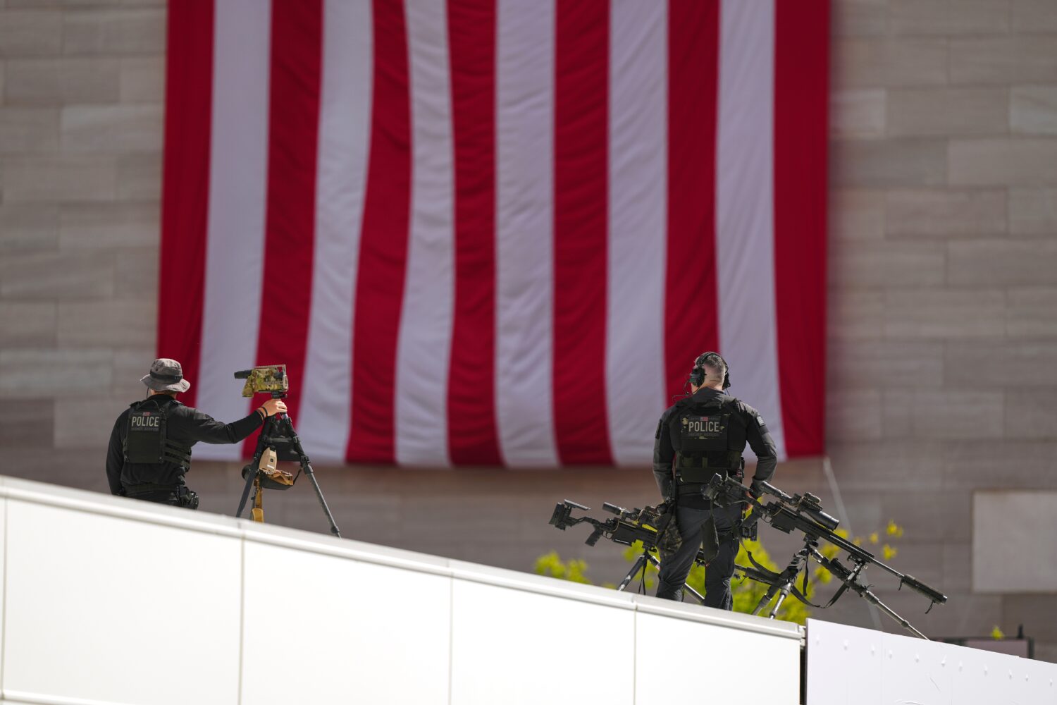 Members of the U.S. Secret Service police conduct overwatch during the IndyCar Freedom 250 Grand Pr...