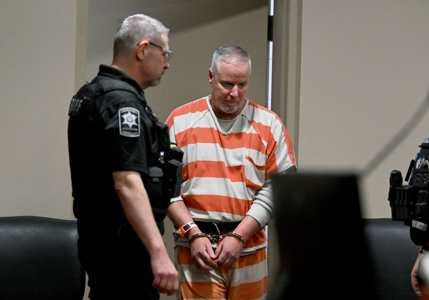 Colin Gray, father of the Apalachee High School shooter Colt Gray, enters the courtroom during his ...
