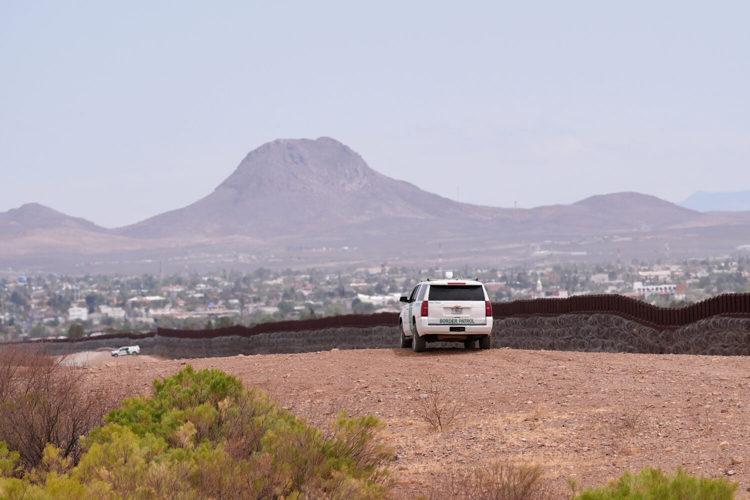 FILE - The U.S. Border Patrol keeps watch along the US-Mexico border Thursday, April 3, 2025, in Do...