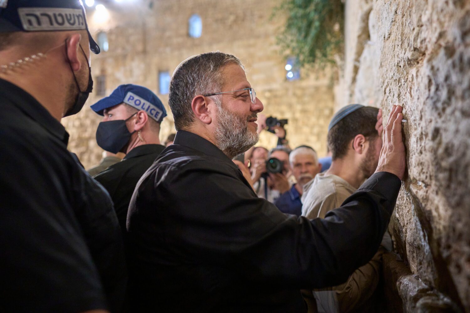 Israel's Minister of National Security, Itamar Ben-Gvir, prays during the mourning ritual of Tisha ...