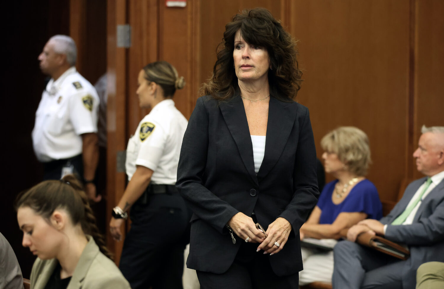 Elaine Rossi, the nanny to Clancy children, enters the courtroom to be a witness during Lindsay Cla...