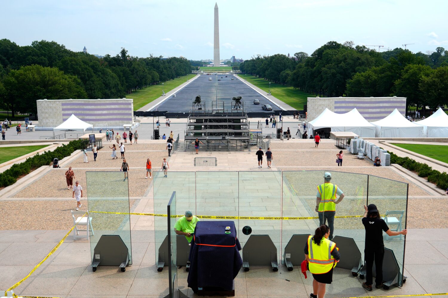 Workers installing bulletproof glass around the podium at the Lincoln Memorial in Washington in pre...