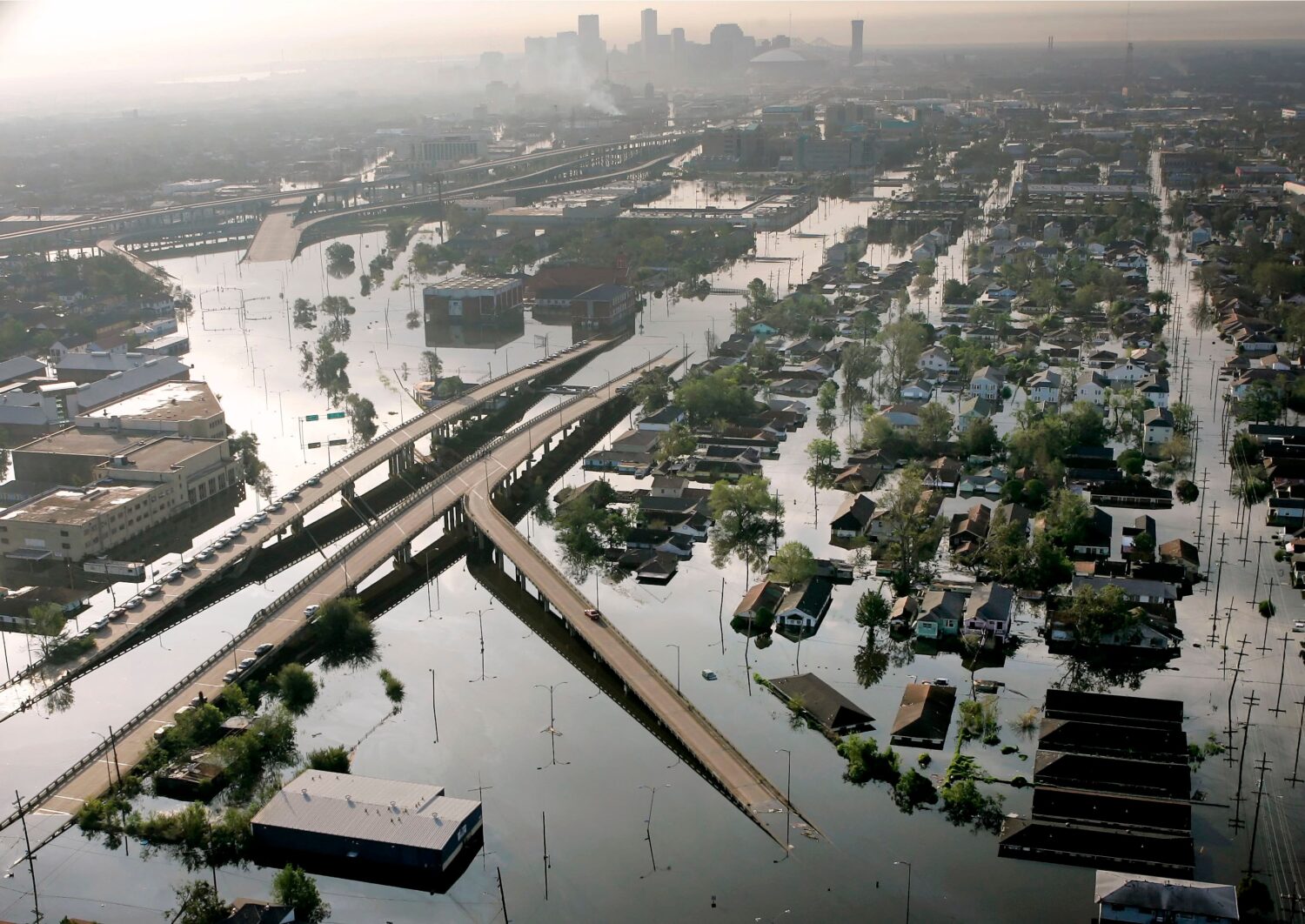 FILE - Floodwaters from Hurricane Katrina fill the streets near downtown New Orleans on Aug. 30, 20...