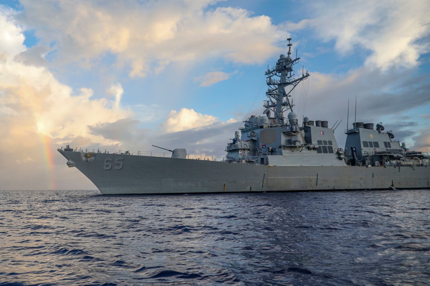 FILE - In this photo provided by U.S. Navy, Arleigh Burke-class guided-missile destroyer USS Benfol...