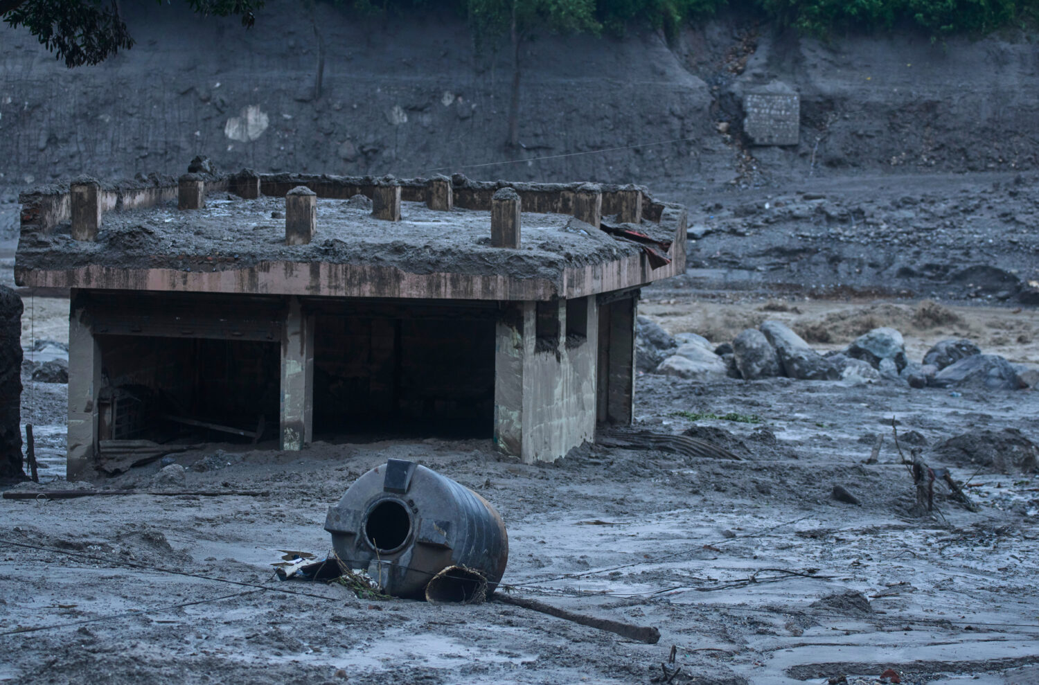 Damage is seen in the aftermath of flash floods in Devighat in the Nuwakot district in Nepal, Thurs...