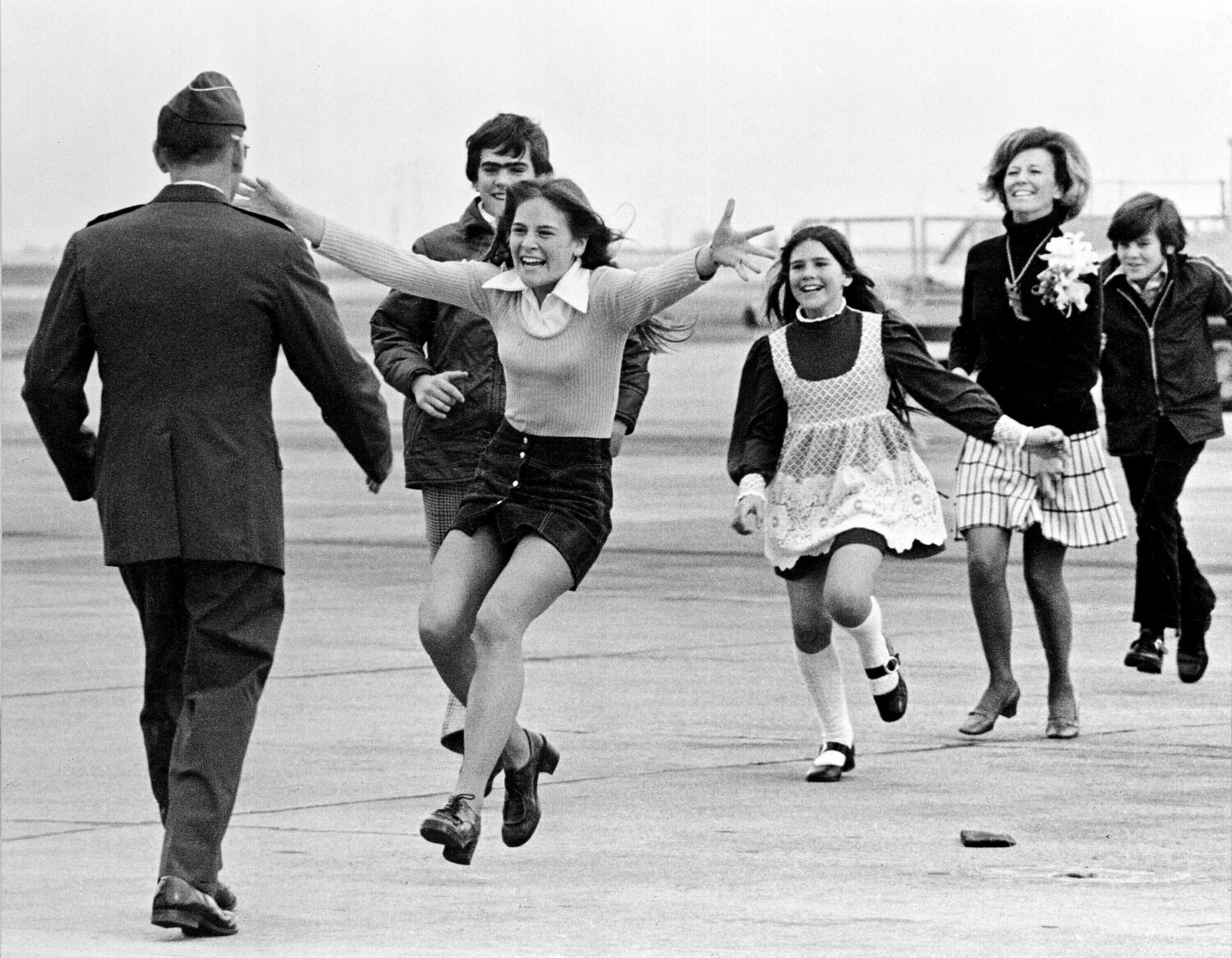 FILE - Released prisoner of war Lt. Col. Robert L. Stirm is greeted by his family at Travis Air For...