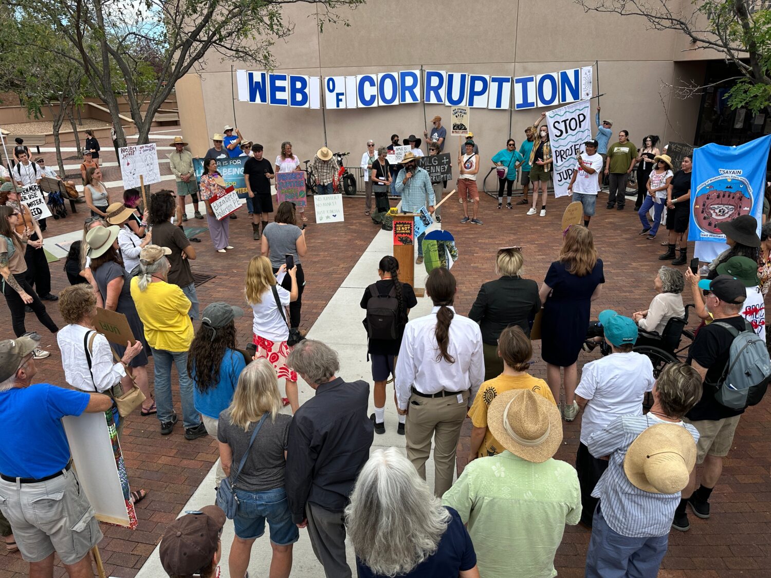 Protesters gather outside the New Mexico Environment Department to voice opposition to the Project ...