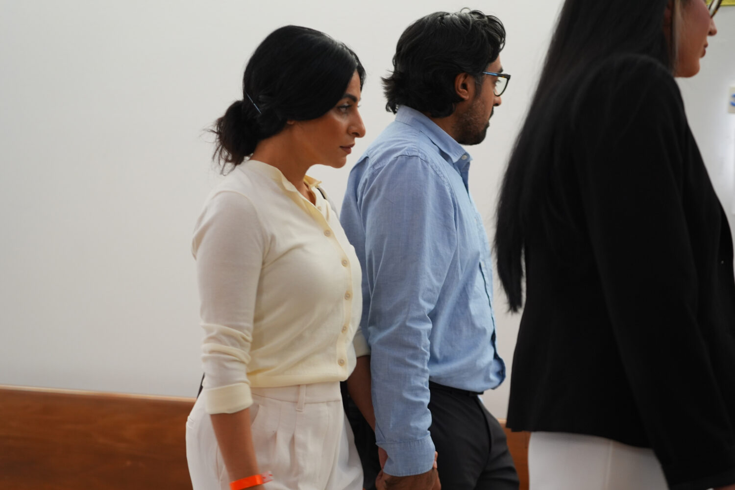 Nausheen Gilkar, left, and her husband Omar Ahmed arrive for a court hearing in Dallas, Tuesday, Au...