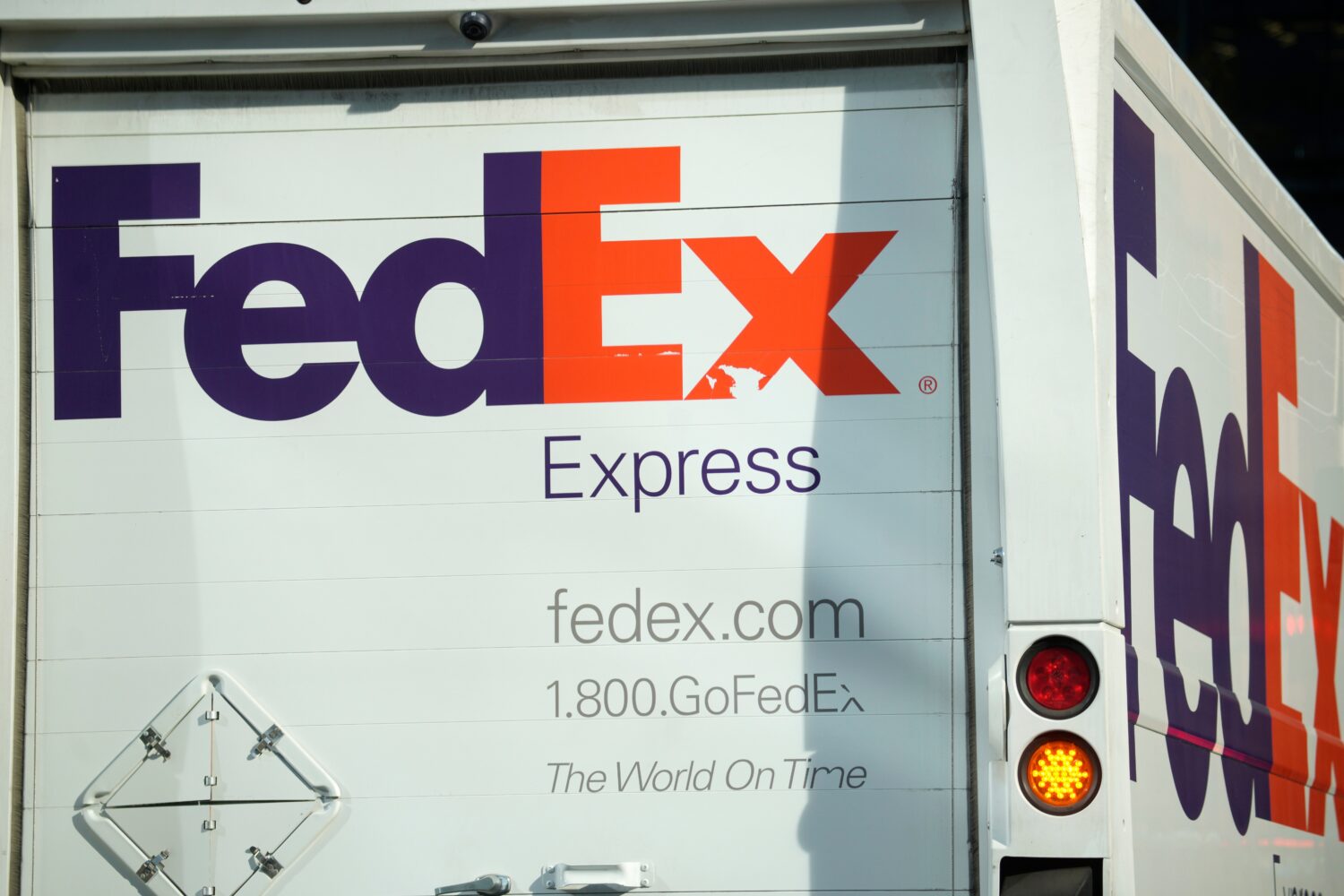 FILE - The company logo is shown on a FedEx delivery van, Sept. 13, 2023, in downtown Denver. (AP P...