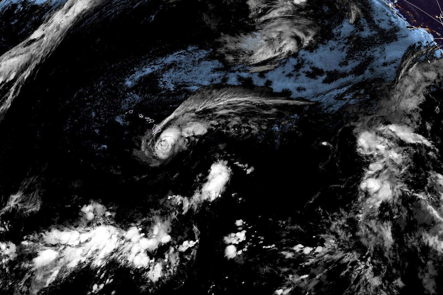 This satellite image released by NOAA shows Tropical Storm Lala over the Pacific Ocean, near Hawaii...