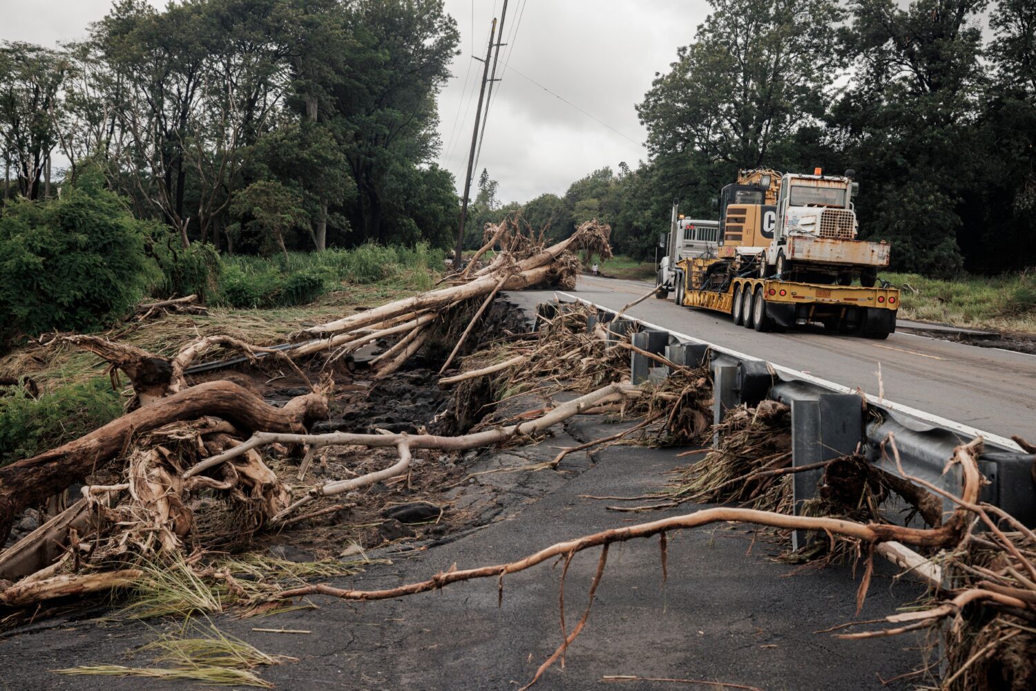 Debris is seen along Hawaiʻi Belt Road near Pahala, Hawaii, Sunday, Aug. 16, 2026, after a severe ...