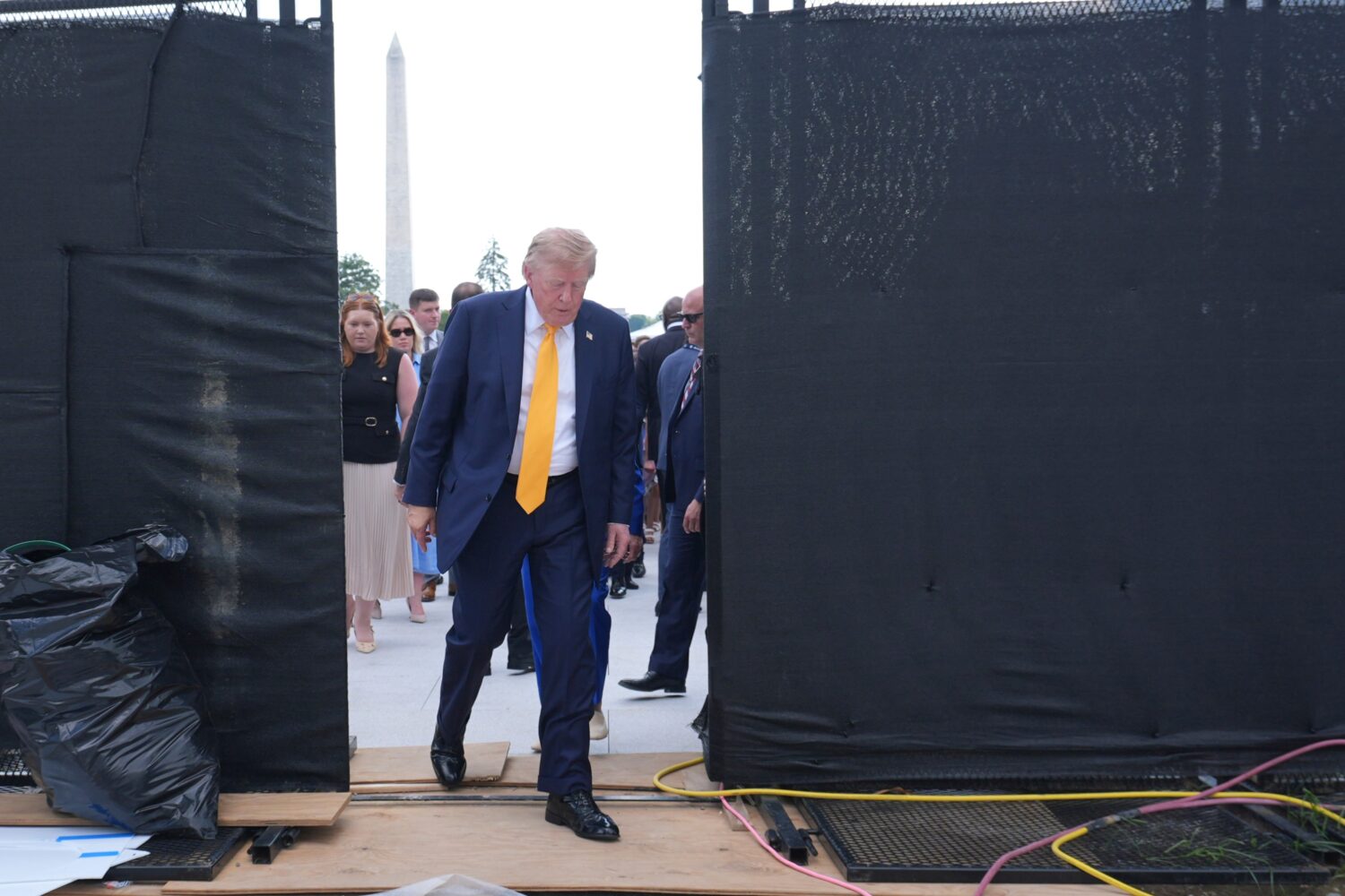 President Donald Trump walks after a back to school event in the Rose Garden of the White House, Mo...