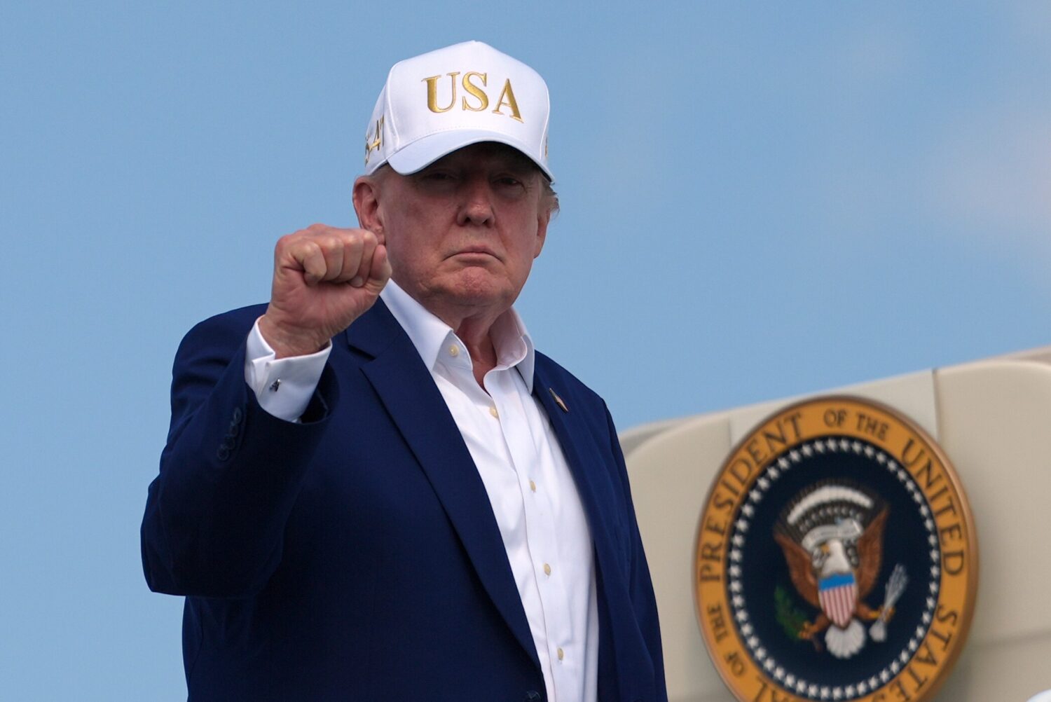 President Donald Trump boards Air Force One at Morristown Airport, Sunday, Aug. 9, 2026, in Morrist...