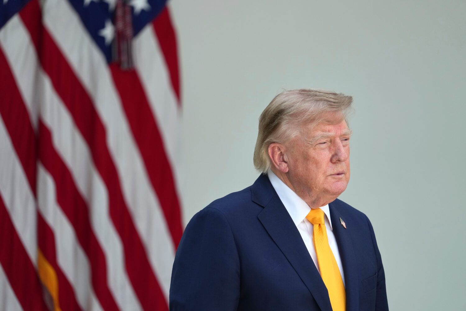 President Donald Trump listens during a back to school event in the Rose Garden of the White House,...